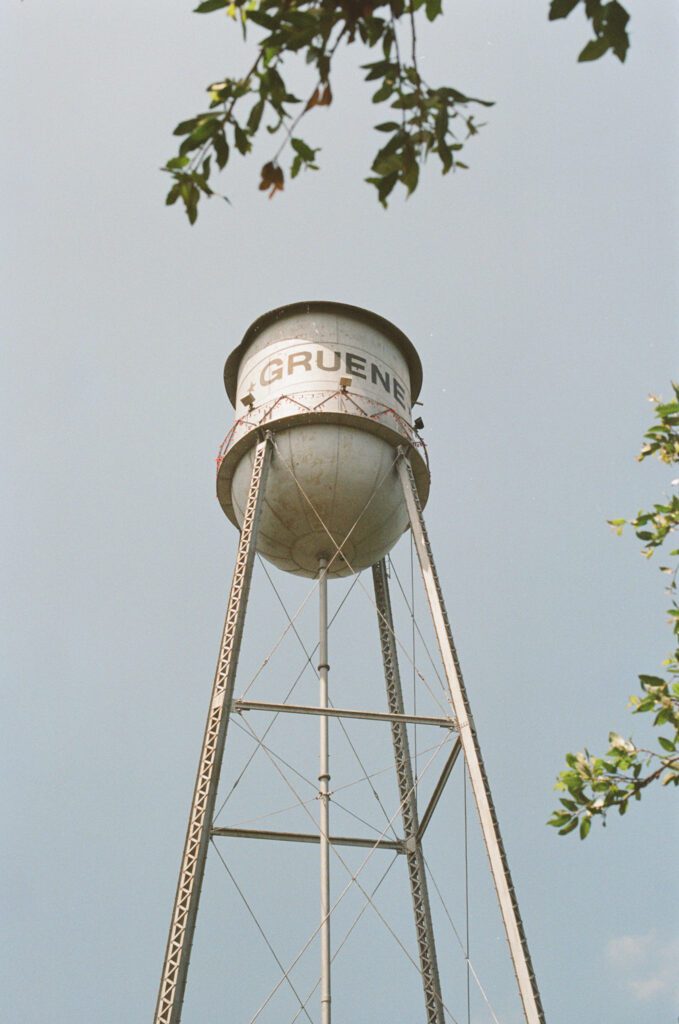 The Gruene water tower, stand tall above the Gristmill Restaurant, one of New Braunfels hidden gems.